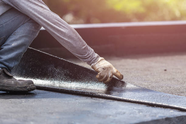 Professional Basement Waterproofing technician working in Basking Ridge, NJ